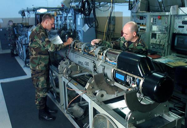 1280px-Two_airmen_inspect_an_electronic_countermeasures_pod